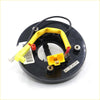 Black circular airbag pretensioner assembly with yellow connectors for spiral cable clock spring mitsubishi pajero 1991-2006