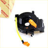 Black plastic spiral cable clock spring with bright yellow cable and orange connector for toyota hilux 2005-2015