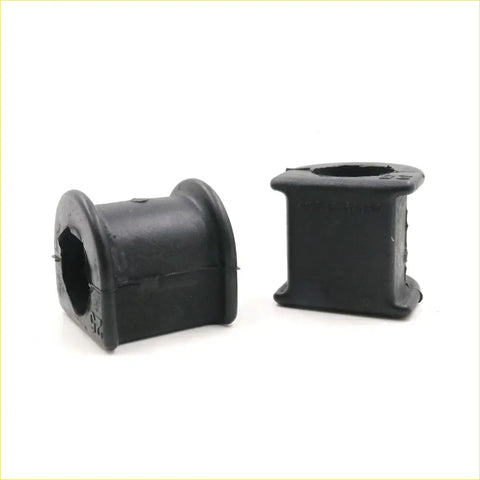 Black rubber stabilizer bushings with cylindrical shape and rounded edges for toyota hilux 1984-1988