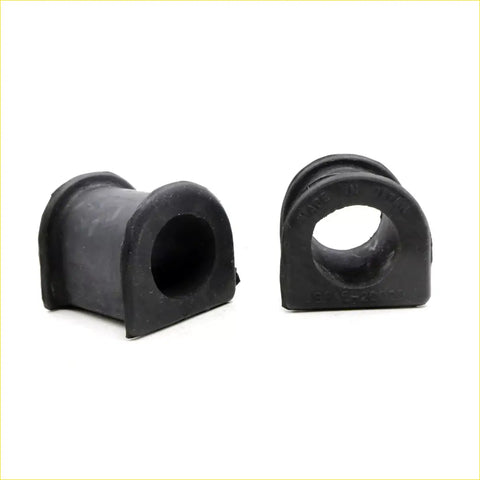 Black rubber stabilizer shaft bushing with cylindrical shape and reinforced edges for Toyota Hilux 1978-1983