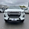 White isuzu d-max pickup with a black front bumper guard and a medium size stainless steel nudge bar installed