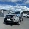 Silver mitsubishi triton with a black stainless steel matte nudge bar bumper guard 2015-2018 model