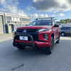 Red mitsubishi triton pickup with matte black stainless steel nudge bar and rugged front bull bar from 2019 to 2023