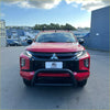 Red mitsubishi triton pickup with black front bumper guard and stainless steel nudge bar medium size 2019-2023