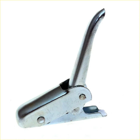 Silver metal staple gun with curved handle and visible screws shown from the back side for mazda bravo tailgate handle