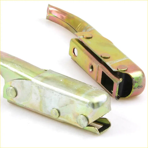 Yellowish metallic trailer hitch coupler with hinge and bolts for tail gate handle set on nissan datsun 1300 back side