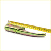 Green and pink metallic tailgate handles with yellow measuring tape for Nissan Datsun 620 ute 1972-1979