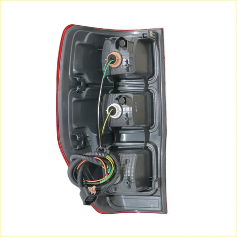 Back side of red and black plastic tail light light with internal wiring for ford ranger t6 px xlt wildtrak 2012-2021