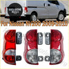 Tail light for Nissan NV200 2009-2015 with red and clear lenses and black mounting brackets shown from back side