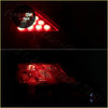 Red led taillight assembly with triangular design and multiple bulbs for 2006-2007 nissan teana back side view