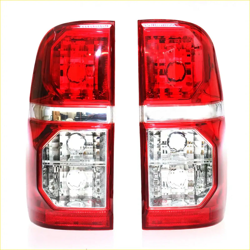 Backside of red and clear led tail lights with modern angular design for toyota hilux sr5 2004-2015 x2