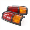 Black-framed dual-lens tail lights with red and amber lenses for nissan datsun 720 ute 1982-1986 backside view