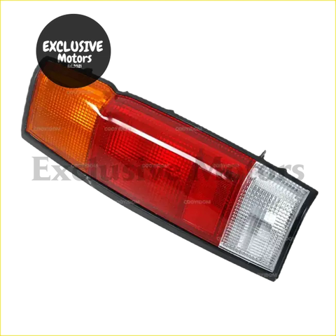 Tail lights x 2 for nissan d21 pickup 1986-1997 showing red and amber plastic tail light with clear lens right side back view