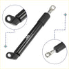 Black cylindrical gas spring with metallic ends and branded logo for tailgate assist on toyota hilux sr5 2015-2023