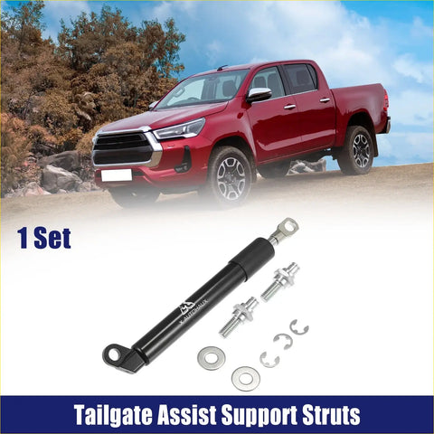 Black tailgate assist shock lift support strut with silver hardware for Toyota Hilux SR5 2015-2023 shown from back side