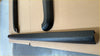 Black textured plastic door sill protector for ford ranger px1/2/3 tailgate cover 2012-2021 shown from back side