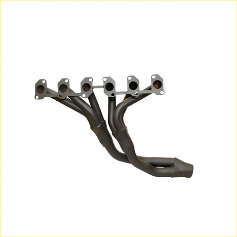 Black dual exhaust manifold with metallic flanges and matte finish for toyota coaster bus 1hz diesel 1990 back side view