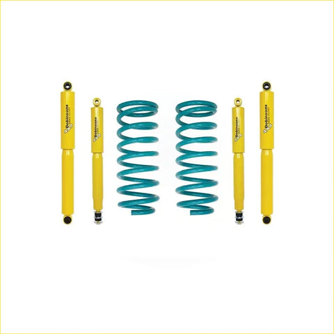 Set of four yellow dobinsons twin tube shock absorbers and two teal coil springs for toyota landcruiser 100 series