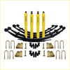 Set of four bright yellow dobinsons twin shock absorbers with black leaf springs and mounting hardware for toyota landcruiser 75 series