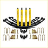 Set of four bright yellow Dobinsons twin shock absorbers with black leaf springs for Toyota Landcruiser 75 series