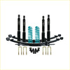 Black and teal coil springs with matching black shock absorbers complete suspension kit for Toyota Landcruiser 76 Series off-road use