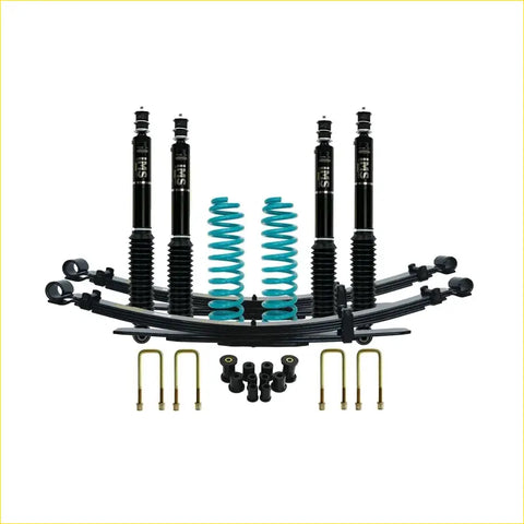Black and teal coil springs with matching black shock absorbers complete suspension kit for Toyota Landcruiser 76 Series off-road use
