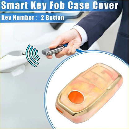 A sleek translucent peach tpu remote key fob cover with gold trim and orange button for toyota rav4 2001-2022