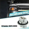 Backside of gray plastic turn signal light bulb socket with black rubber gasket for Toyota Tacoma Tundra headlights