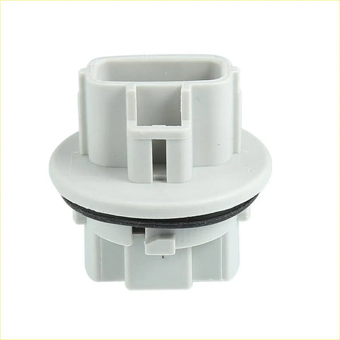 White plastic turn signal bulb socket with black rubber gasket for toyota tacoma tundra 2005-2023 backside view