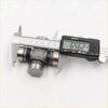 Silver metallic universal joint for datsun nissan bluebird measured with digital caliper showing precise size