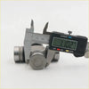 Silver metallic universal joint being measured with a digital caliper for nissan datsun 510 bluebird sss kit