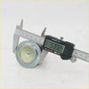 Upper ball joint assembly for toyota hilux 2005-2015 in metallic blue-green being measured with digital caliper