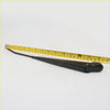 Black rubberized windshield wiper arm for Toyota Hilux 1979-1983 with curved handle and metal pivot point