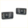 Gray plastic inner door handle pulls with rectangular design and recessed housing for mazda b2000 1980-1993 backside view