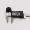 Digital caliper with black and silver body showing 13.73 mm measurement for x2 tail gate rubber bumper nissan datsun