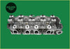 Silver metallic z24 cylinder head for nissan d21 2.4l 2388cc with machined design and multiple valve cover bolts